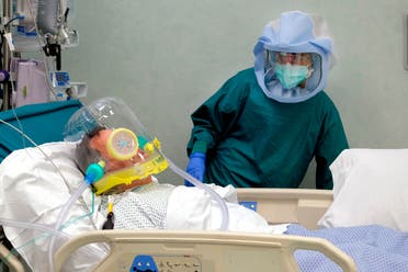 A nurse tends to a patient in the intensive care unit of the COVID-19 department of the Policlinic of Tor Vergata in Rome on April 17, 2020. (AP)