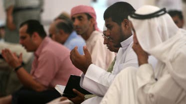 Muslims pray during the holy month of Ramadan inside a mosque in Dubai October 5, 2006. (Reuters)