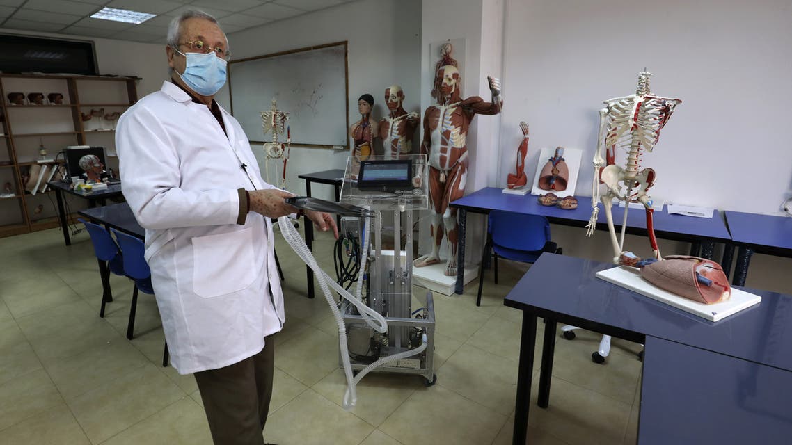 Dr Hani Abdinof the Palestinian Al-Quds University speaks during an interview on April 23, 2020, as he showcases a respirator device built on campus. (AFP)