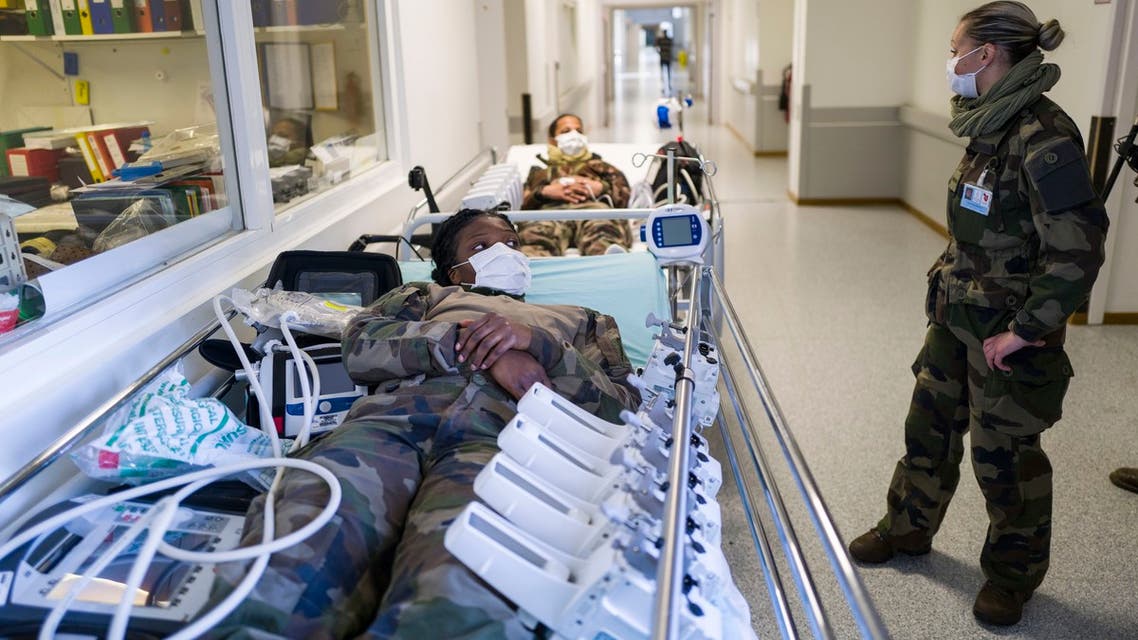 French soldiers take part on March 24, 2020 in a drill at the military field hospital set up outside the Emile Muller Hospital in Mulhouse where the first of 30 COVID-19 patients are expected to arrive.