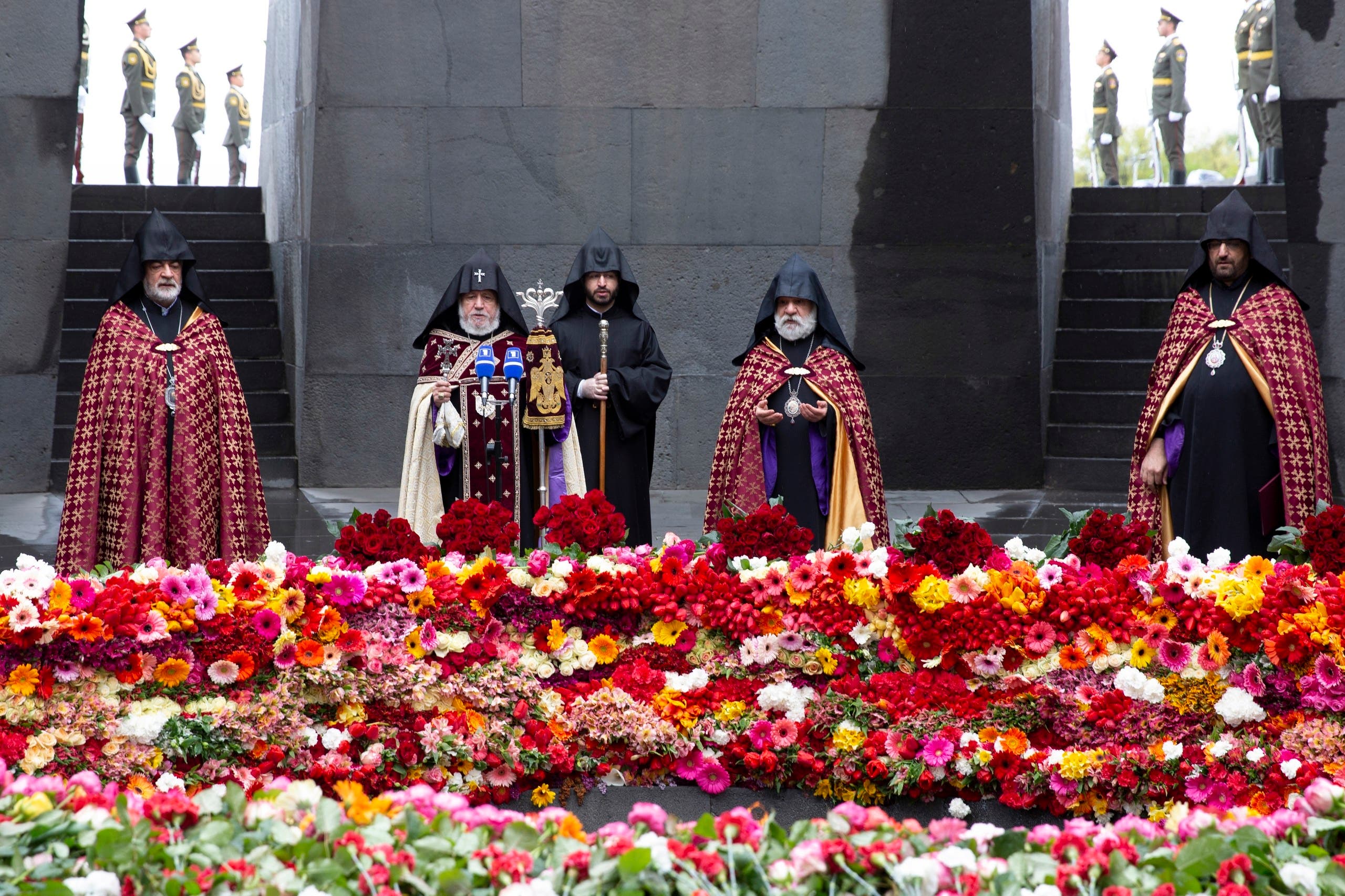 Armenian Apostolic Church leader Catholicos Garegin II, second left, and other Armenian Apostolic Church clerics, observe social distancing guidelines as they attend a memorial service to commemorate the 105th anniversary of the massacre in Yerevan, Armenia, on Friday, April 24, 2020. (AP)
