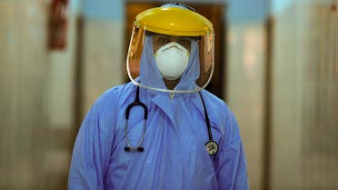 A member of the medical staff at the infectious diseases unit of the Imbaba hospital in the capital Cairo, is pictured on April 19,2020, during the novel coronavirus pandemic crisis. 