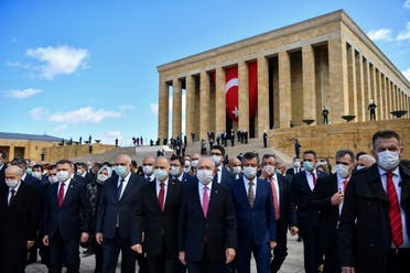 Turkish parliamentarians wearing face masks visit the mausoleum of Turkey's founder Mustafa Kemal Ataturk during a ceremony marking centennial celebrations for the founding of the Turkish parliament, which is also National Sovereignty and Children's Day, in Ankara, Turkey, on Thursday, April 23, 2020. (AP)
