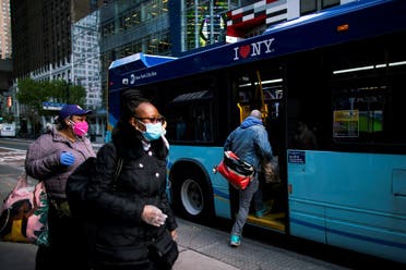 People board an MTA bus by the back door, during the outbreak of the coronavirus in New York City. (File photo: Reuters)