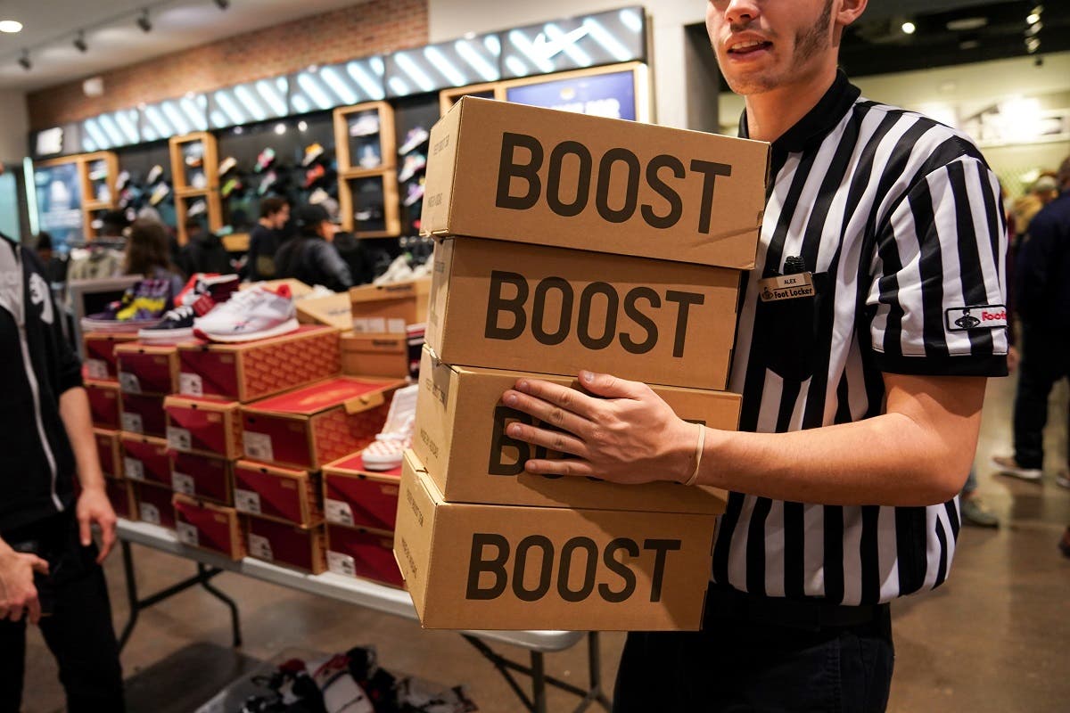 A Foot Locker employee retrieves boxes of Kanye West's Yeezy shoes in King of Prussia mall on Black Friday, a day that kicks off the holiday shopping season, in King of Prussia, Pennsylvania, U.S., on November 29, 2019. (Reuters)