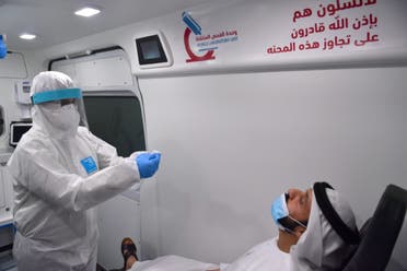 Dubai Corporation for Ambulance Services' mobile testing unit that provides free coronavirus screening at home for the elderly. (WAM)