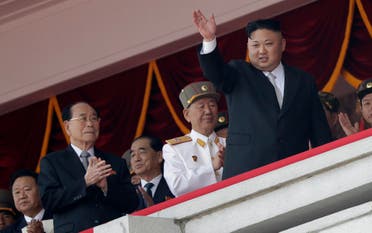 North Korean leader Kim Jong Un, right, waves while Kim Yong Nam, second left, Choe Ryong Hae, left, Pak Pong Ju, center, and Hwang Pyong So, fourth left, clap during a military parade on Saturday, April 15, 2017, in Pyongyang, North Korea. (AP)
