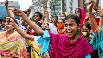 Textile workers in Bangladesh hard hit by coronavirus demand wages, flouting lockdown