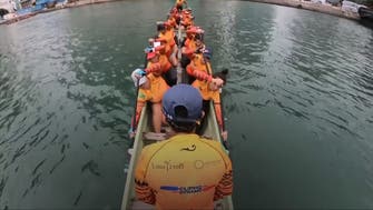 Hong Kong's Filipino domestic helpers compete in dragon boat race