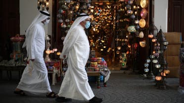 People wear protective face masks following the outbreak of the coronavirus disease (COVID-19), as they walk to shop ahead of the holy month of Ramadan in Manama, Bahrain, April 23, 2020. (Reuters)