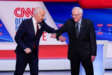 Joe Biden and Bernie Sanders greet one another before they participate in a Democratic presidential primary debate at CNN Studios in Washington on March 15, 2020. (File Photo: AP)
