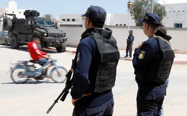 Police officers stand guard in the town of Ben Guerdane, near the Libyan border, in Tunisia on April 16, 2019.  (Reuters)