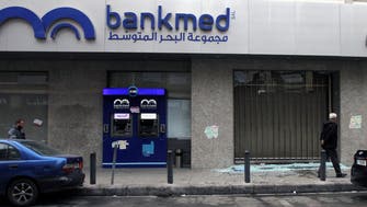 Banks smashed in Lebanon's Tripoli, protests turn violent