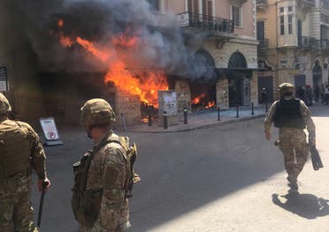 Lebanese soldiers are seen near a bank on fire during unrest, as an economic crisis brings demonstrations back onto the streets in Tripoli, Lebanon April 28, 2020. (File photo: Reuters)