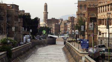 Flood water fills a canal following heavy rains in the Old City of Yemen's capital Sanaa on April 14, 2020. (AFP)