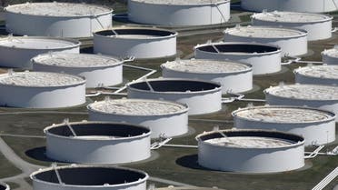 Crude oil storage tanks are seen from above at the Cushing oil hub, appearing to run out of space to contain a historic supply glut that has hammered prices, in Cushing, Oklahoma. (Reuters)