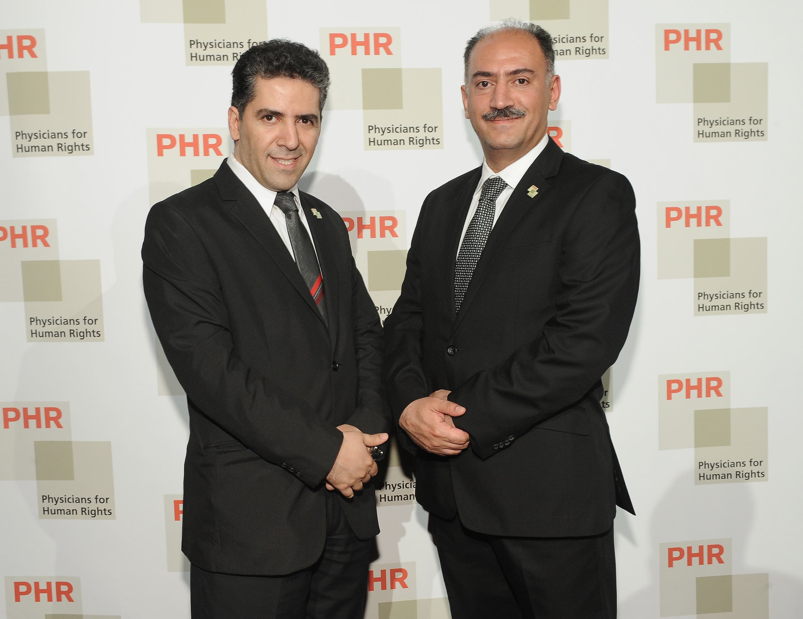 Renowned HIV doctors praised for their work by the World Health Organization Kamiar and Arash Alaei attend 2015 Physicians For Human Rights Gala on April 28, 2015 in New York City. (AP)