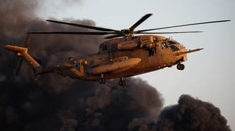 Syria says Israeli helicopters fire rockets inside southern Syria 