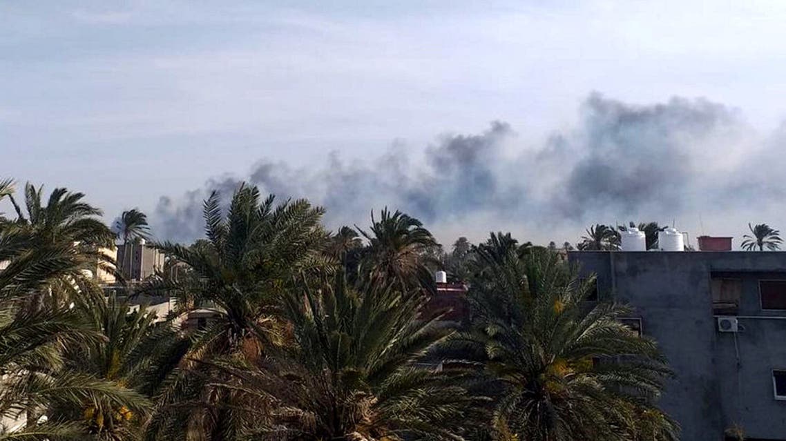تصاعد الدخان من مطار معيتيقة بطرابلس يوم 13 أبريل (رويترز)
