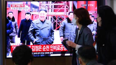 People watch a TV showing a file image of North Korean leader Kim Jong Un during a news program at the Seoul Railway Station in Seoul, South Korea, Saturday, May 2, 2020. (The Associated Press)