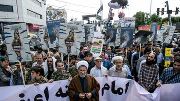 Iranians take part in a protest marking the annual al-Quds Day (Jerusalem Day) on the last Friday of the holy month of Ramadan in Tehran. (Reuters)