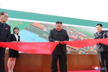 North Korean leader Kim Jong Un attends the completion of a fertiliser plant, together with his younger sister Kim Yo Jong, in a region north of the capital, Pyongyang, May 2, 2020. (KCNA/via Reuters)