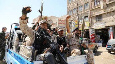 Houthi troops ride on the back of a police patrol truck after participating in a Houthi gathering in Sanaa, Yemen February 19, 2020. (Reuters) 