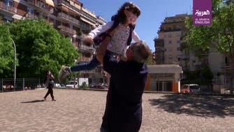 Watch: Italian Grandfather reunites with grandchild after coronavirus separation