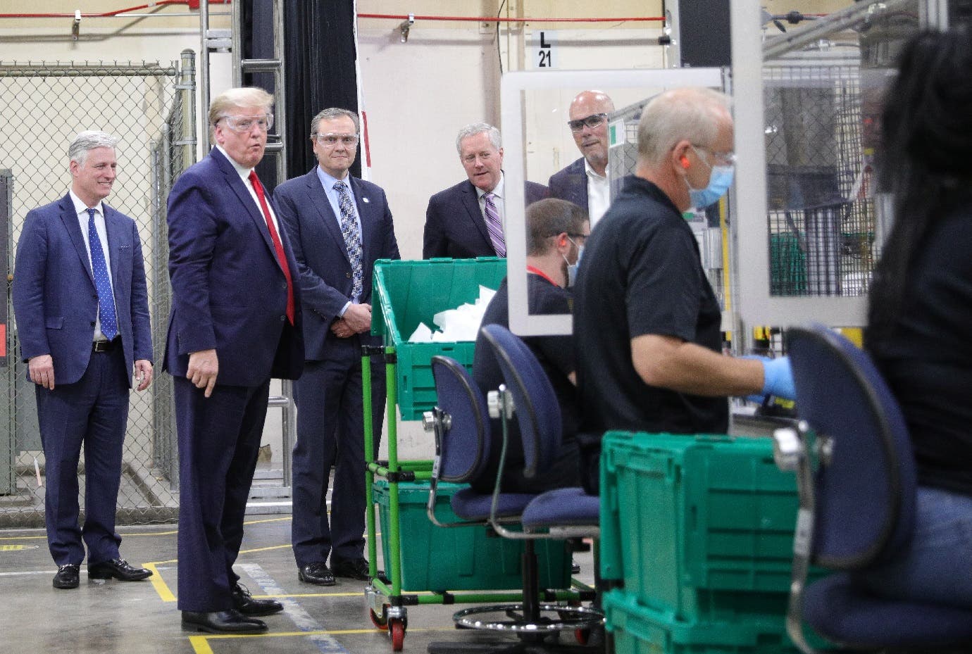 Trump observes an assembly line during a visit to a Honeywell facility making face masks for the coronavirus outbreak in Phoenix, Arizona, US, May 5, 2020. (Reuters)