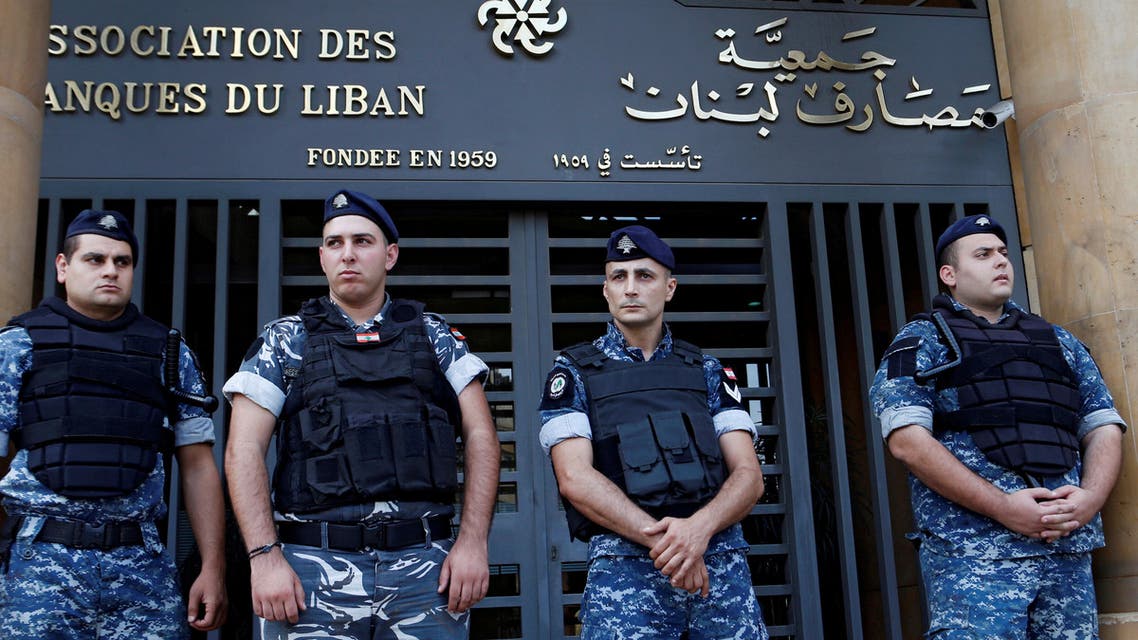 Lebanese police stand outside the entrance of the Association of Banks in downtown Beirut, Lebanon on November 1, 2019. (Reuters) 