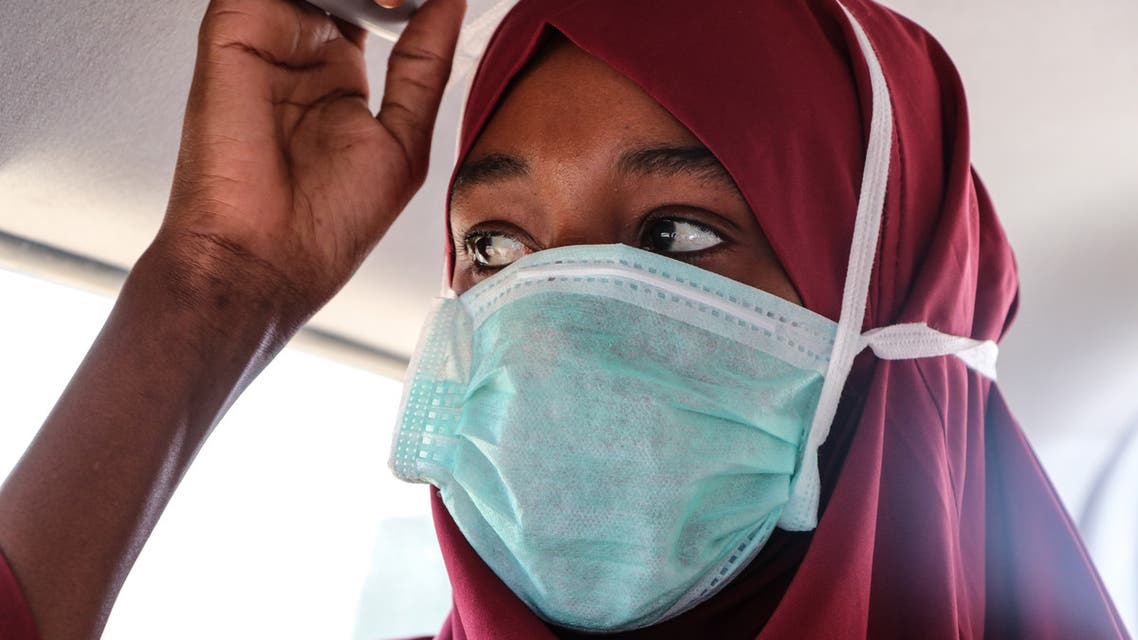 A suspected patient with the COVID-19 Coronavirus is transfered to the public hospital by ambulance in Mogadishu on March 29, 2020. (AFP)