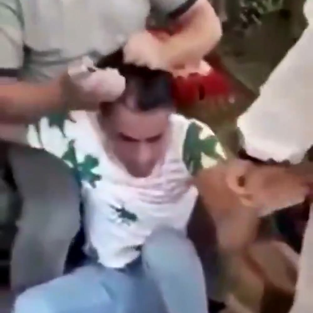 Forced Gay Sex Porn - Watch: Man forced to shave head for insulting Iraq's Muqtada al-Sadr, says  Reporter | Al Arabiya English