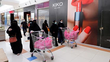 Women shop at a shopping mall after the Saudi government eased a curfew and allowed stores to open, following the outbreak of the coronavirus disease (COVID-19), in Riyadh. (Reuters)