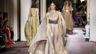 A model presents a creation by Zuhair Murad during the Women's Fall-Winter 2019/2020 Haute Couture collection fashion show in Paris, on July 3, 2019. 