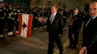 Lebanon's President Emile Lahoud reviews an honour guard in Baabda, near Beirut, November 23, 2007. (Reuters)