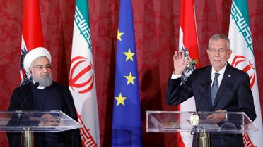 Austrian President Alexander Van der Bellen and Iranian President Hassan Rouhani attend a news conference in Vienna, Austria, July 4, 2018. REUTERS/Leonhard Foeger