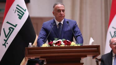 Iraqi Prime Minister-designate Mustafa al-Kadhimi delivers a speech during the vote on the new government at the parliament headquarters in Baghdad. (Reuters)