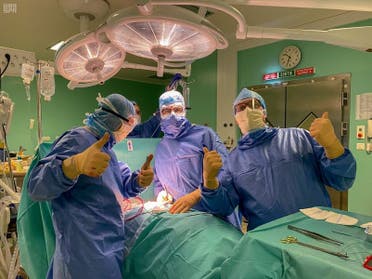 Hani al-Jahani and his team after the surgery at the operation theatre in Colmar Hospital, France.