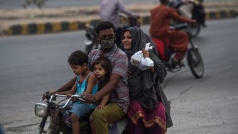 Pakistanis crowd markets as coronavirus lockdown eased mid-Ramadan