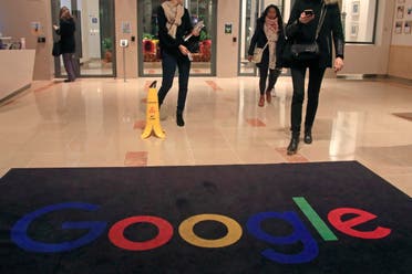 Google employees walks out of the entrance hall of Google France in Paris. (File photo: AP) 