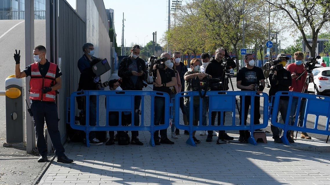 Journalists gather as Barcelona's players arrive to undergo coronavirus tests at the Ciutat Esportiva Joan Gamper in Sant Joan Despi near Barcelona on May 6, 2020. (AFP)