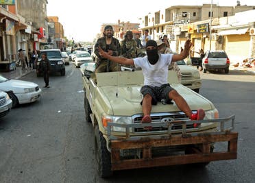 عناصر تقاتل إلى جانب ميليشيات الوفاق في ليبيا - فرانس برس