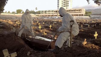 Cemetery workers bury coronavirus victims in Rio
