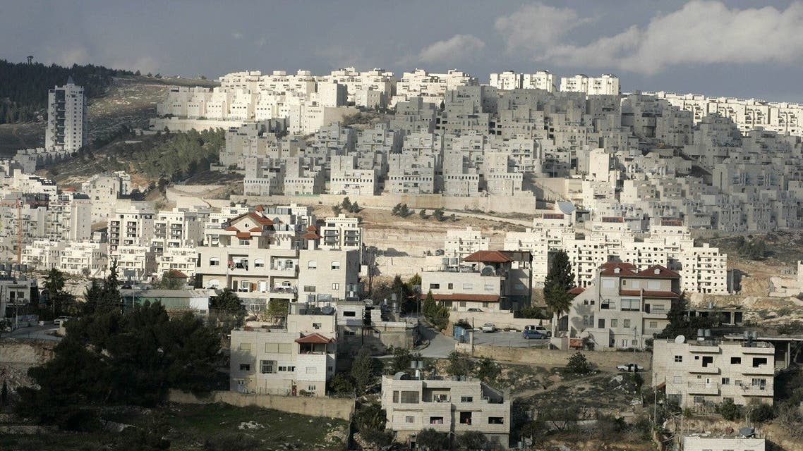 A picture shows housing units (rear of the picture) at at Har Homa Israeli settlement near the West Bank city of Bethlehem. (File photo: AFP)