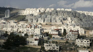 A picture shows housing units (rear of the picture) at at Har Homa Israeli settlement near the West Bank city of Bethlehem. (File photo: AFP)
