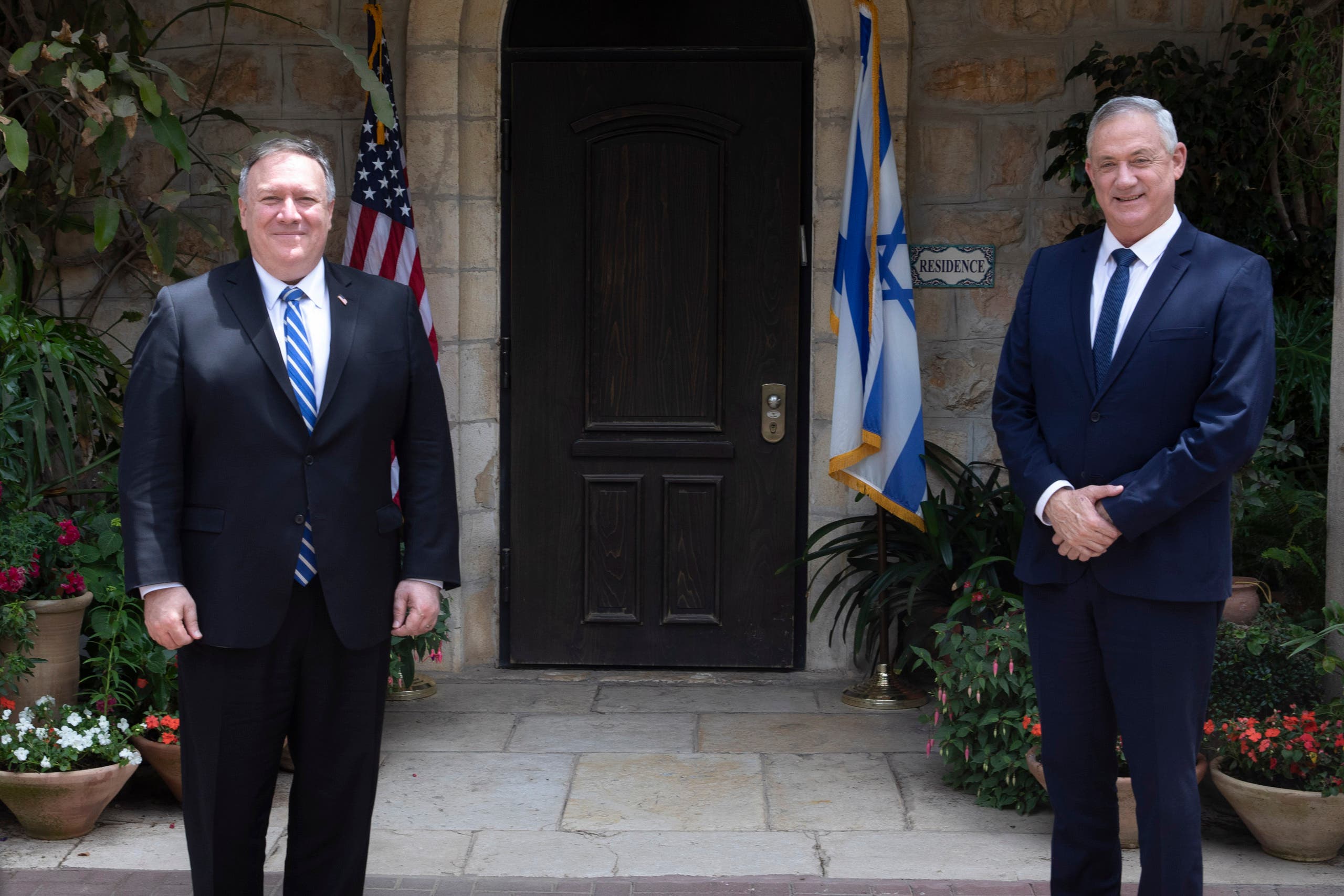 U.S. Secretary of State Mike Pompeo, left, meets Israeli Blue and White party leader Benny Gantz in Jerusalem, Wednesday, May 13, 2020. (AP)
