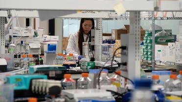 Research assistant Yi Kuo, of RNA medicines company Arcturus Therapeutics, conducts research on a vaccine for the novel coronavirus (COVID-19) at a laboratory in San Diego, California, U.S., March 17, 2020. REUTERS/Bing Guan