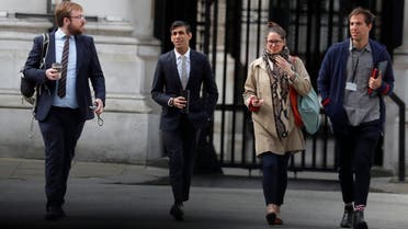 Britain's Chancellor of the Exchequer Rishi Sunak (second left) AP