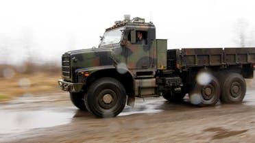 An Oshkosh truck using the TerraMax autonomous driving system drives along a test course outside of Pittsburgh, Pennsylvania, March 1, 2012. The robotic truck is being developed by Oshkosh and its partners for the U.S. military. (Reuters)