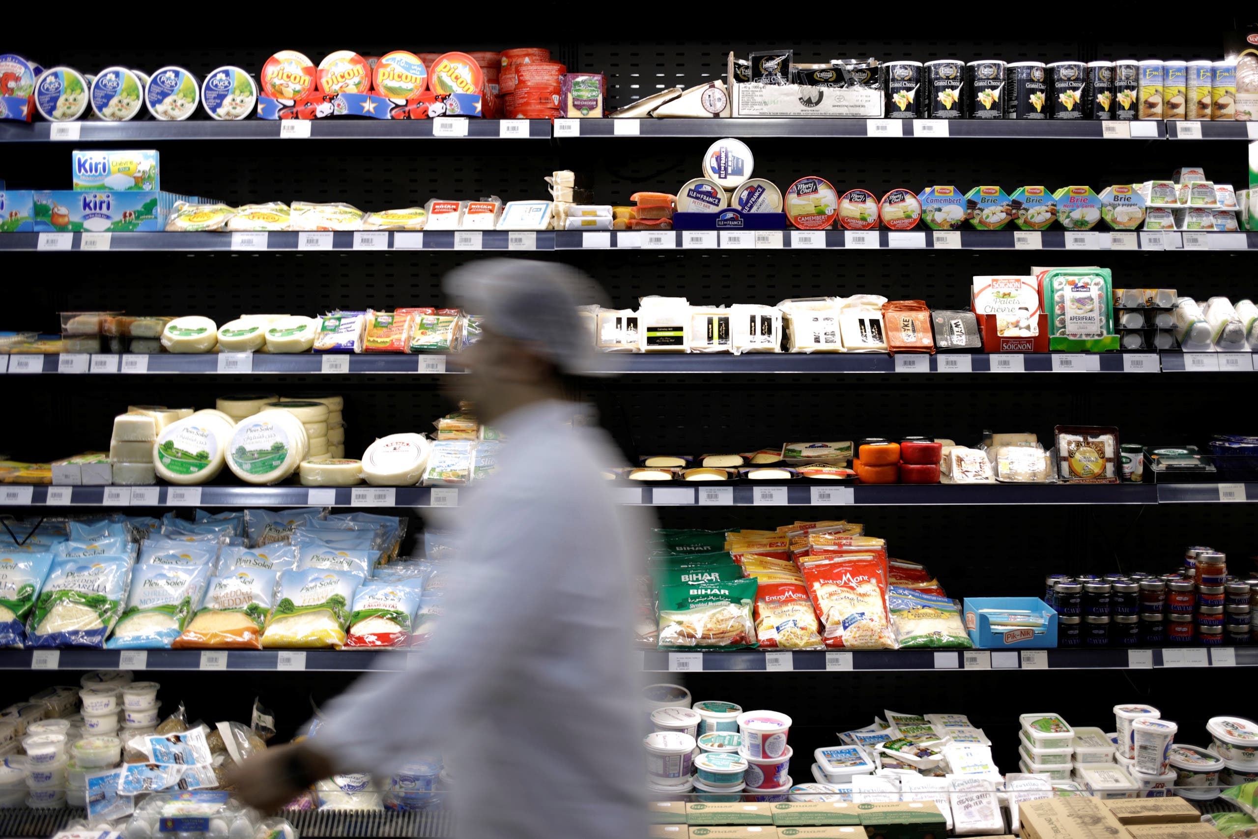 A worker walks past food items displayed for sale inside a supermarket in Beirut, Lebanon. (File photo: Reuters)